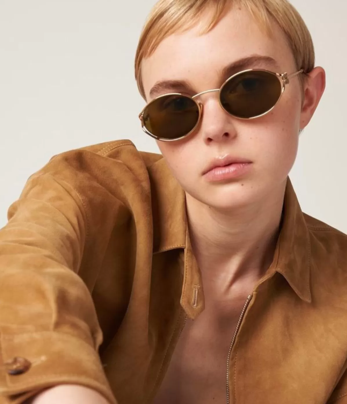 Miu Miu Oval Sunglasses in Brass Gold Flash Sale