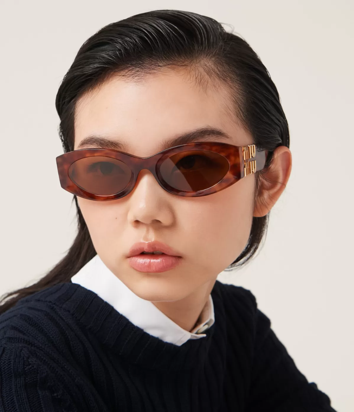 Miu Miu Oval Sunglasses in Brown Havana Hot