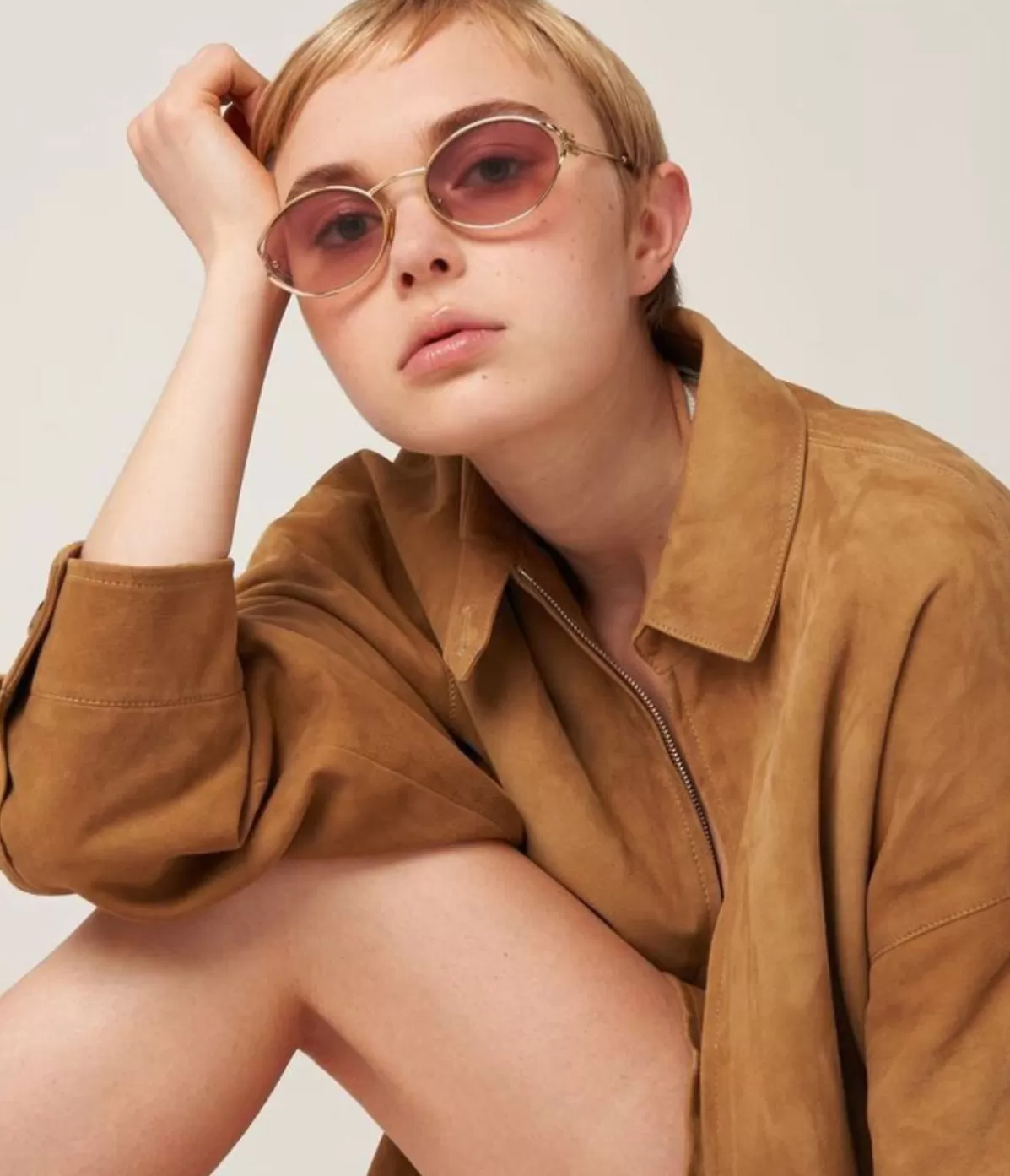 Miu Miu Oval Sunglasses in Gold Outlet